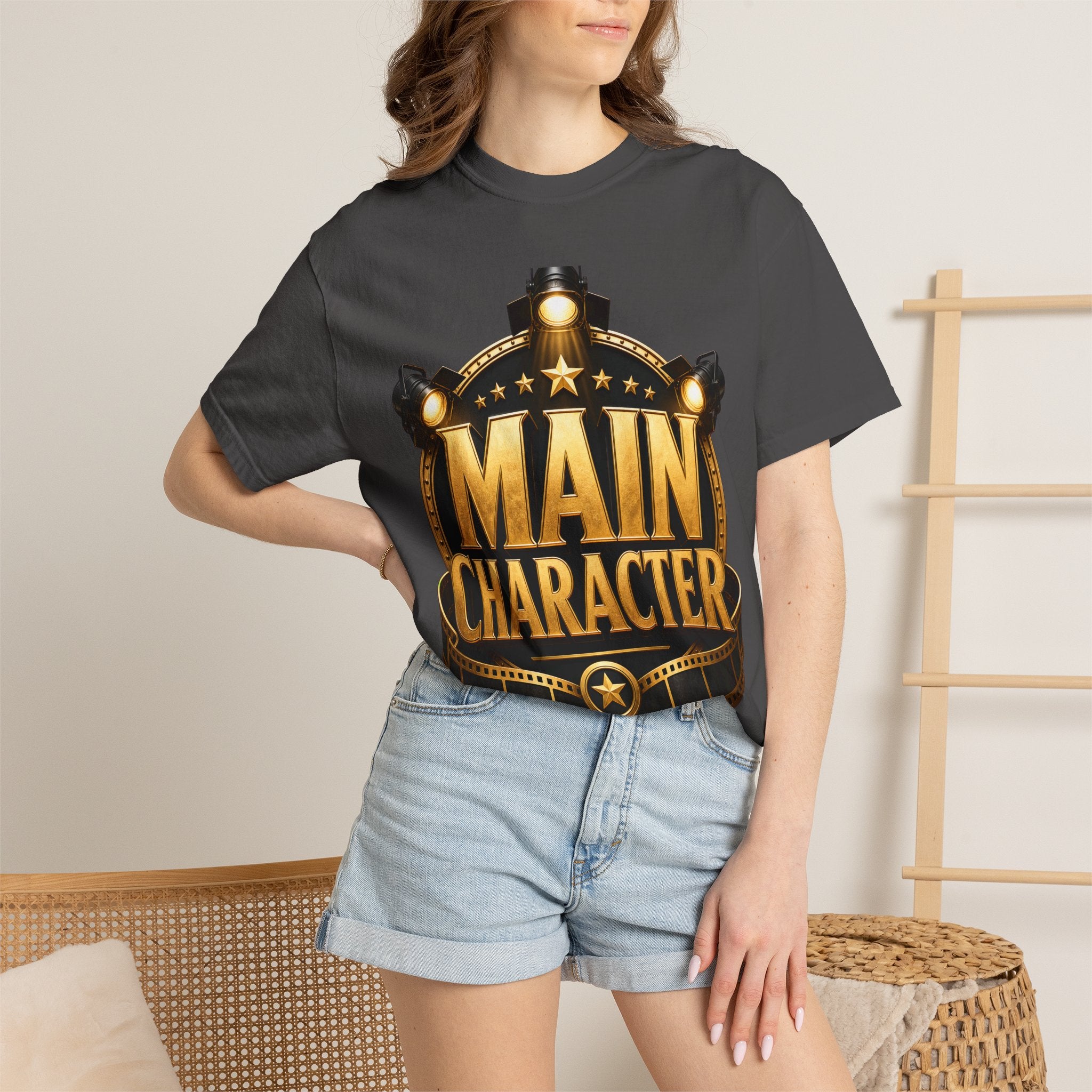 Main Character Graphic T‑Shirt — Gold Film Badge Design