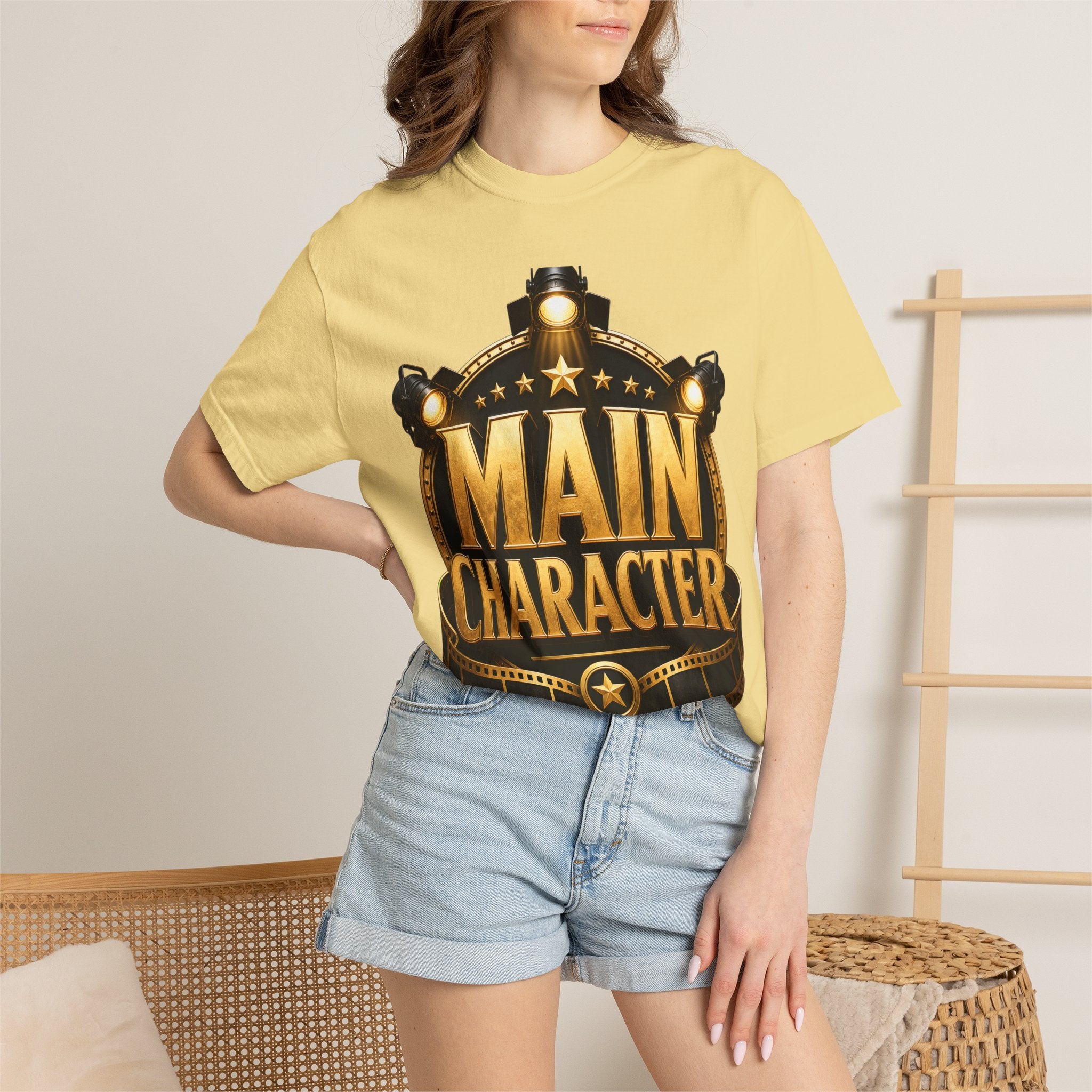 Main Character Graphic T‑Shirt — Gold Film Badge Design
